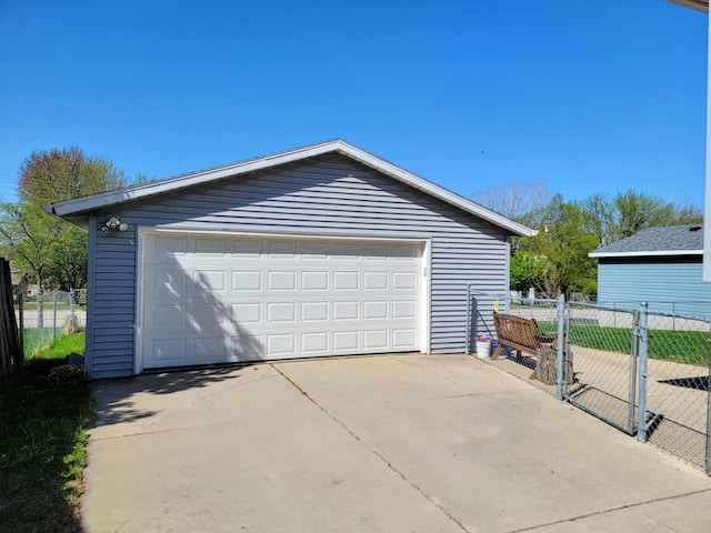 detached garage with fence