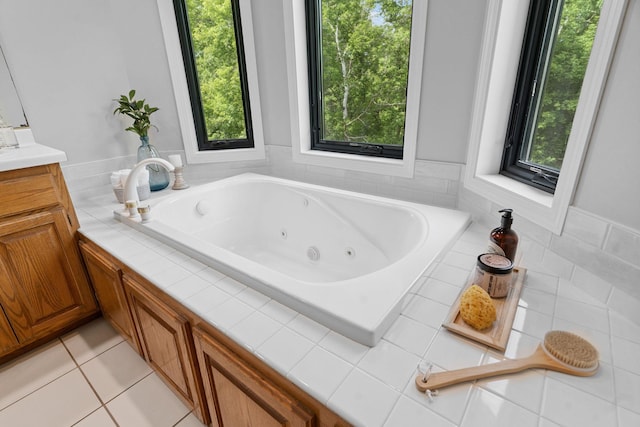 4255 Wexford Way, Eagan, MN 55122 - bathroom with plenty of natural light, a jetted tub, vanity, and tile patterned floors