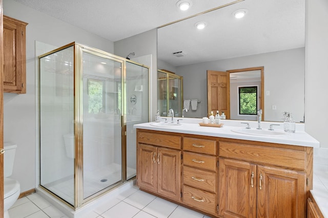 4255 Wexford Way, Eagan, MN 55122 - full bathroom with double vanity, a stall shower, tile patterned flooring, recessed lighting, and a textured ceiling