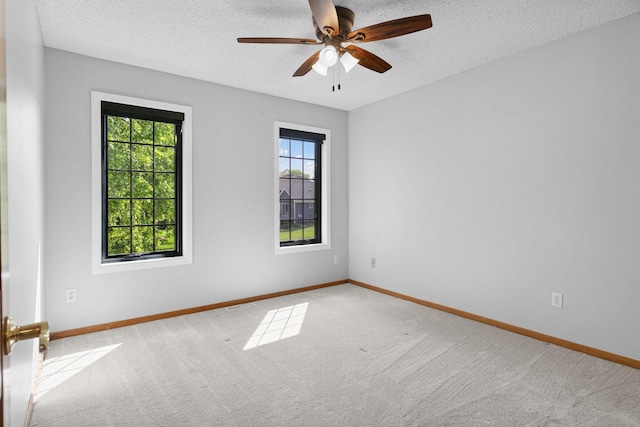 4255 Wexford Way, Eagan, MN 55122 - carpeted empty room featuring a textured ceiling and ceiling fan