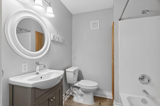 4255 Wexford Way, Eagan, MN 55122 - bathroom featuring vanity, wood finished floors, and shower / tub combination
