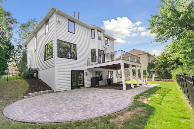 4255 Wexford Way, Eagan, MN 55122 - back of property with a patio, a wooden deck, stairway, and a playground
