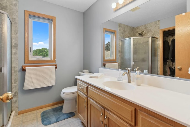 1034 111th Ave NE, Blaine, MN 55434 - full bathroom with plenty of natural light, vanity, a stall shower, and toilet