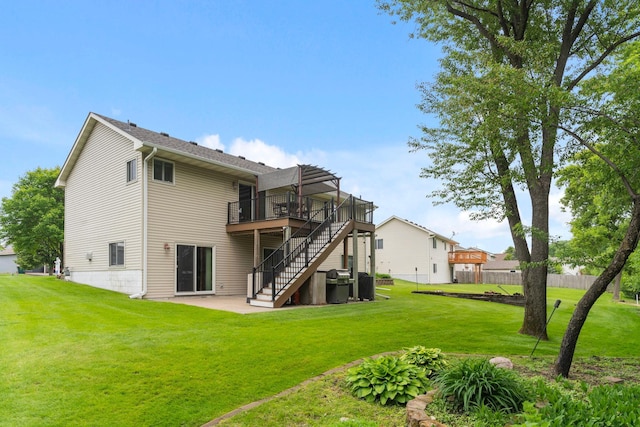 1034 111th Ave NE, Blaine, MN 55434 - rear view of house with stairway, a wooden deck, and a patio area