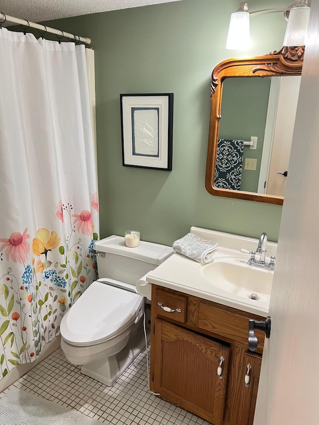 full bathroom with tile patterned floors, vanity, toilet, and a shower with shower curtain
