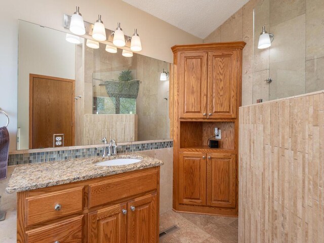 15825 Garden View Dr, Apple Valley, MN 55124 - full bath featuring walk in shower, vanity, and lofted ceiling