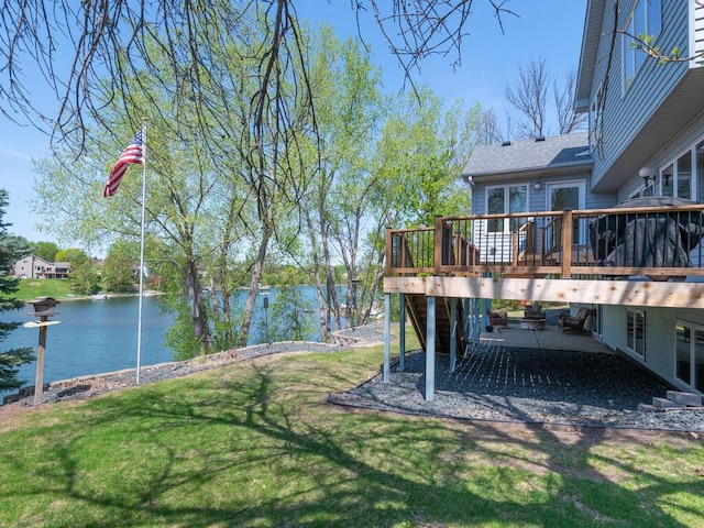 15825 Garden View Dr, Apple Valley, MN 55124 - view of green lawn with a deck with water view