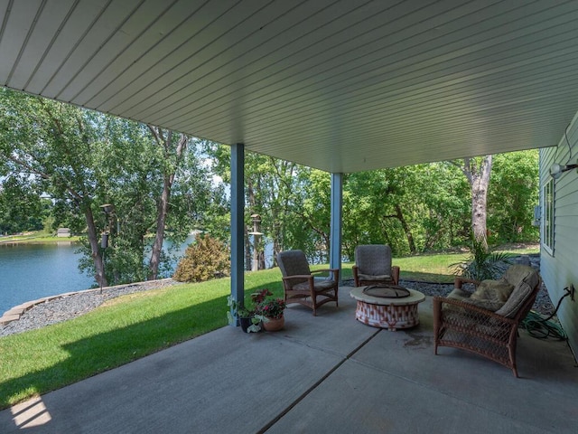 15825 Garden View Dr, Apple Valley, MN 55124 - view of patio / terrace featuring a water view and an outdoor fire pit