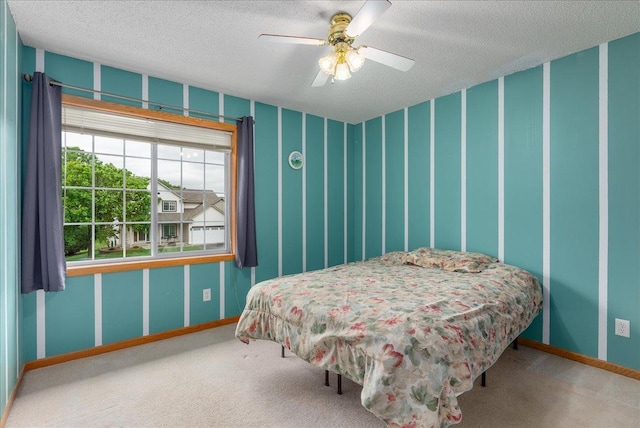 9230 Cheney Trl, Inver Grove Heights, MN 55076 - bedroom with baseboards, carpet floors, a textured ceiling, and ceiling fan