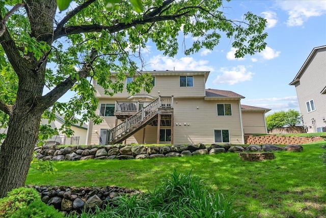 9230 Cheney Trl, Inver Grove Heights, MN 55076 - rear view of property featuring stairs, a wooden deck, and a yard