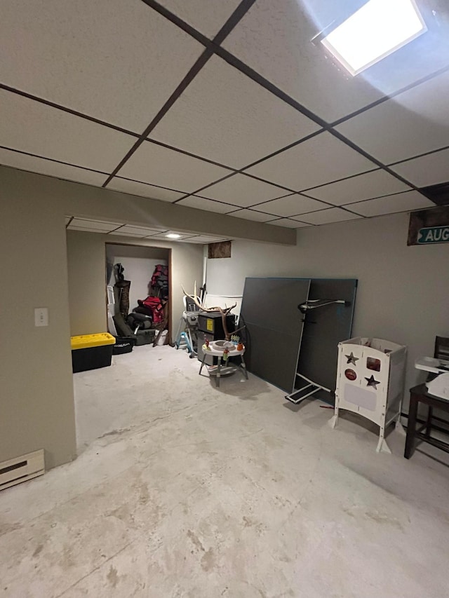 7424 Ely Lake Dr, Fayal Twp, MN 55734 - finished below grade area featuring a drop ceiling and baseboard heating