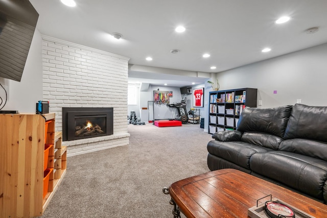 living room with recessed lighting, carpet flooring, and a fireplace