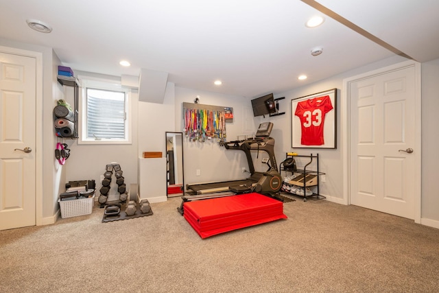 exercise room with carpet floors, recessed lighting, and baseboards