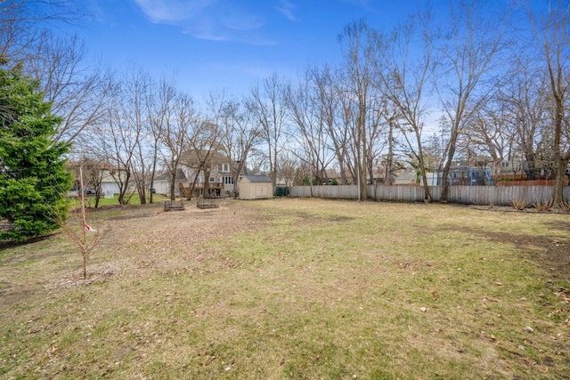 view of yard with an outbuilding and a storage unit