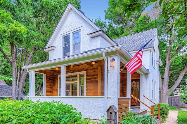 984 Milton St N, Saint Paul, MN 55103 - victorian-style house with stucco siding and a shingled roof