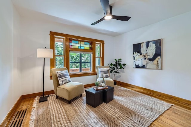 984 Milton St N, Saint Paul, MN 55103 - living area with wood-type flooring and ceiling fan