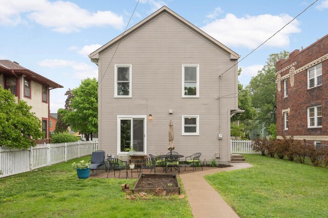 3214 Blaisdell Ave, Minneapolis, MN 55408 - rear view of property with a patio area
