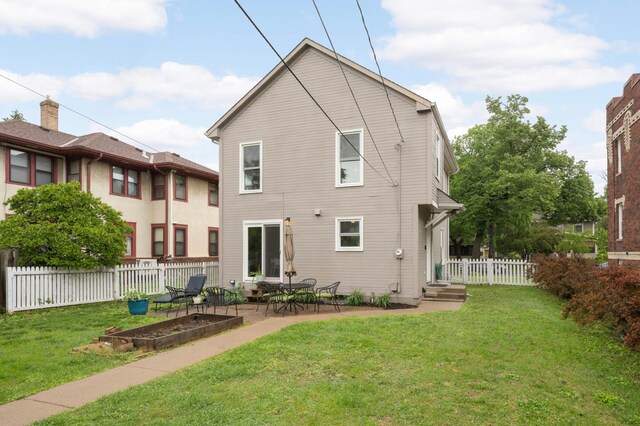 3214 Blaisdell Ave, Minneapolis, MN 55408 - back of house with a patio
