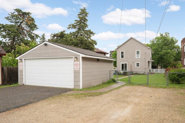 3214 Blaisdell Ave, Minneapolis, MN 55408 - detached garage featuring a gate