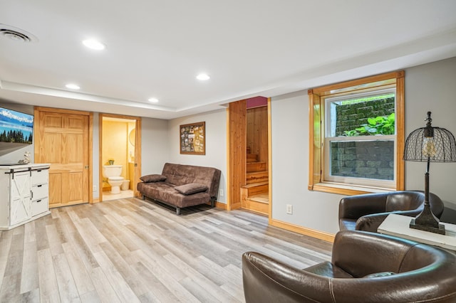 W10005 710th Ave, River Falls, WI 54022 - living room featuring light wood finished floors, recessed lighting, and baseboards