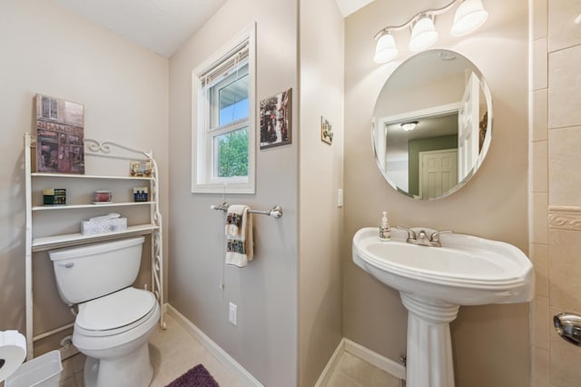 27180 Lakewood Dr NW, Stanford Twp, MN 55040 - half bath featuring toilet and baseboards