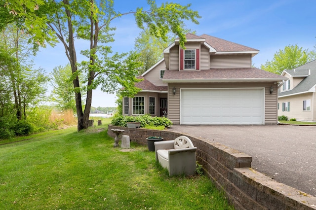 27180 Lakewood Dr NW, Stanford Twp, MN 55040 - traditional-style home with driveway, a front yard, roof with shingles, and an attached garage