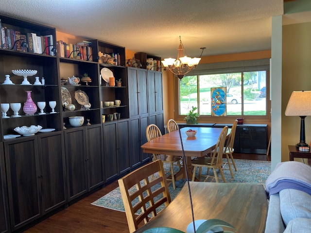 875 20th St, Windom, MN 56101 - dining area featuring dark wood finished floors and a chandelier