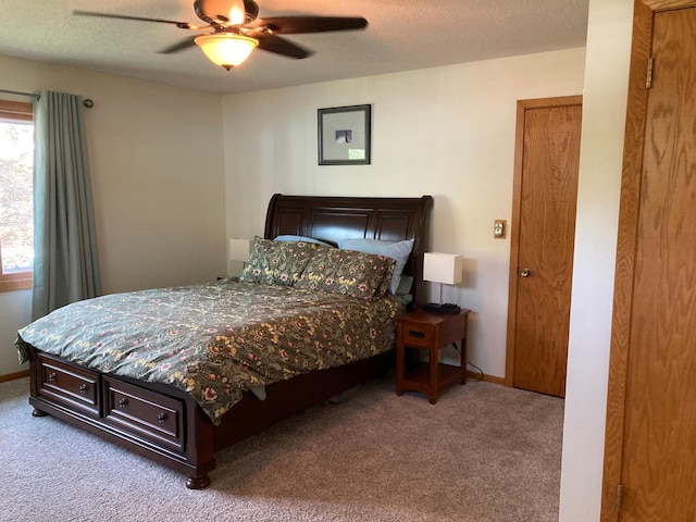 875 20th St, Windom, MN 56101 - bedroom featuring carpet floors, a ceiling fan, and baseboards