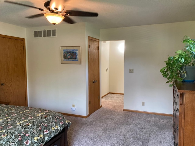 875 20th St, Windom, MN 56101 - bedroom with carpet flooring, baseboards, and a ceiling fan