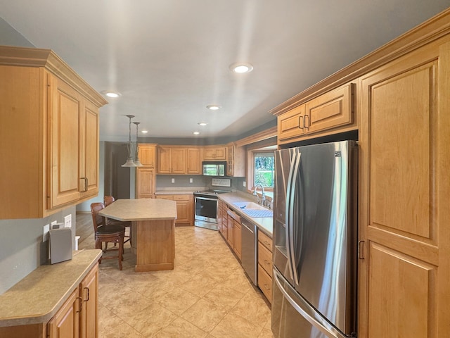1539 111th St, Slayton Twp, MN 56172 - kitchen featuring stainless steel appliances, a sink, light countertops, recessed lighting, and a kitchen island