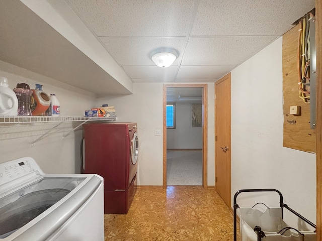 1539 111th St, Slayton Twp, MN 56172 - laundry area featuring separate washer and dryer, light floors, and baseboards