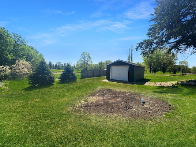 1539 111th St, Slayton Twp, MN 56172 - view of yard featuring an outdoor structure, a detached garage, and driveway