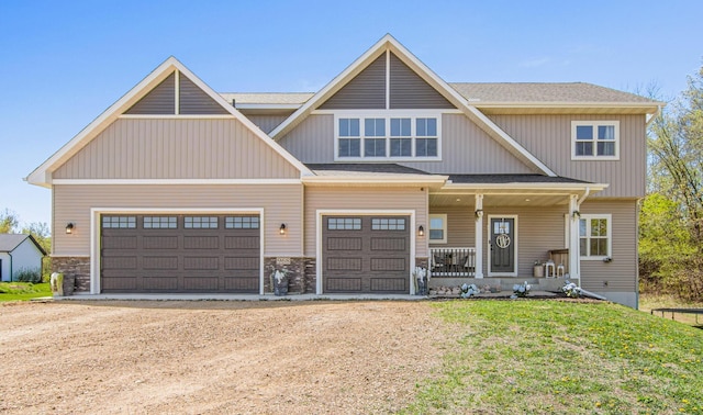968 150th Ave, New Richmond, WI 54017 - view of front of home with dirt driveway, covered porch, a front lawn, and stone siding