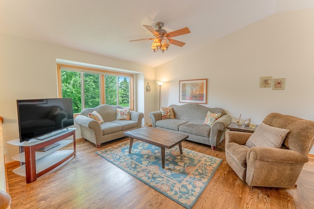1434 Benson Blvd E, Stillwater, MN 55082 - living room featuring vaulted ceiling, a ceiling fan, and wood finished floors