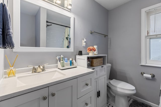 5548 34th Ave S, Minneapolis, MN 55417 - full bathroom featuring toilet, vanity, baseboards, tile patterned floors, and a shower with curtain