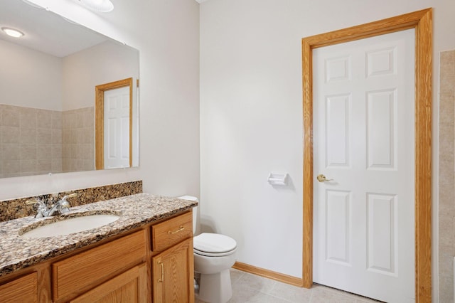 full bath with toilet, tile patterned floors, and vanity