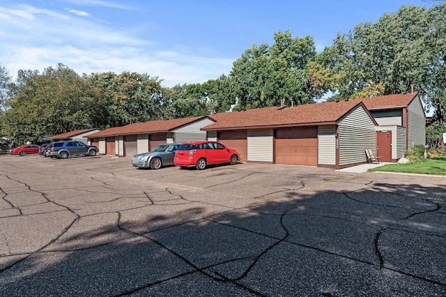 10276 Hanson Blvd NW, Coon Rapids, MN 55433 - view of front of house featuring community garages
