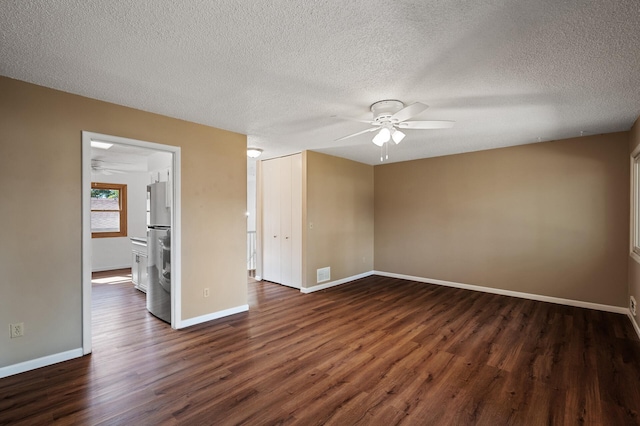 10276 Hanson Blvd NW, Coon Rapids, MN 55433 - empty room with ceiling fan, dark wood finished floors, a textured ceiling, and baseboards