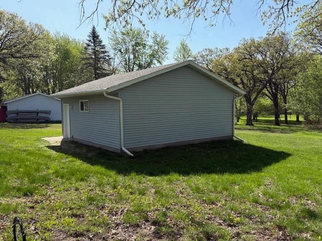 1300 10th St NE, Sauk Rapids Twp, MN 56379 - view of side of home with a yard