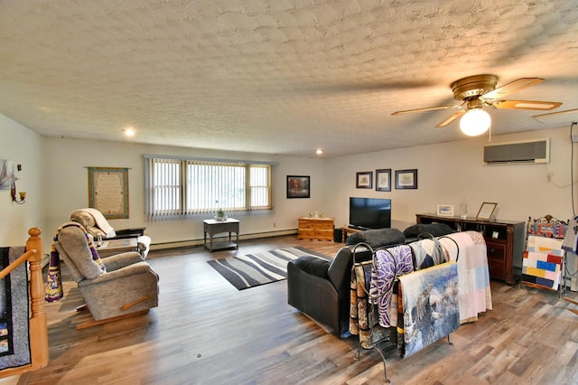 1300 10th St NE, Sauk Rapids Twp, MN 56379 - living area with a wall mounted air conditioner, wood finished floors, a ceiling fan, and a textured ceiling
