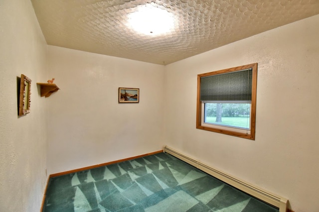 1300 10th St NE, Sauk Rapids Twp, MN 56379 - empty room with a baseboard heating unit and carpet flooring