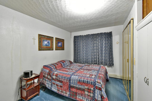 1300 10th St NE, Sauk Rapids Twp, MN 56379 - carpeted bedroom with a textured ceiling and a baseboard heating unit
