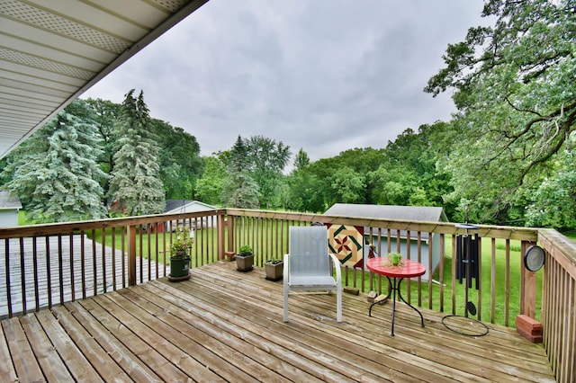 1300 10th St NE, Sauk Rapids Twp, MN 56379 - wooden terrace with a lawn