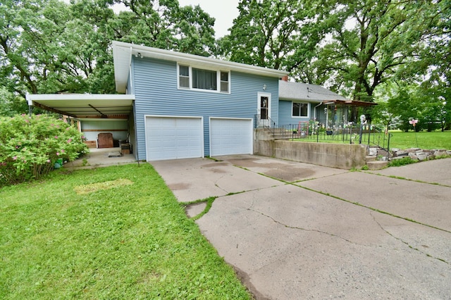 1300 10th St NE, Sauk Rapids Twp, MN 56379 - split level home featuring an attached garage, a front yard, and driveway