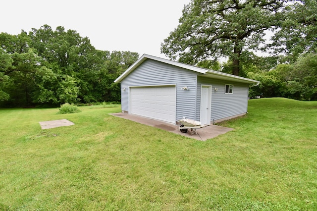 1300 10th St NE, Sauk Rapids Twp, MN 56379 - detached garage with view of wooded area
