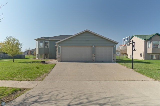 view of front of property with central AC, a garage, and driveway