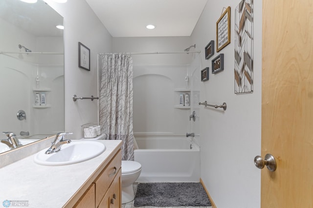 bathroom with shower / tub combo with curtain, vanity, toilet, and tile patterned floors