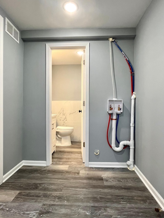 2616 30th Ave S, Minneapolis, MN 55406 - bathroom featuring toilet, wood finished floors, baseboards, and recessed lighting