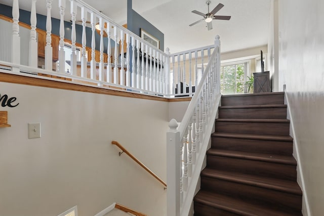 6609 91st Trl N, Brooklyn Park, MN 55445 - stairway featuring a ceiling fan and baseboards