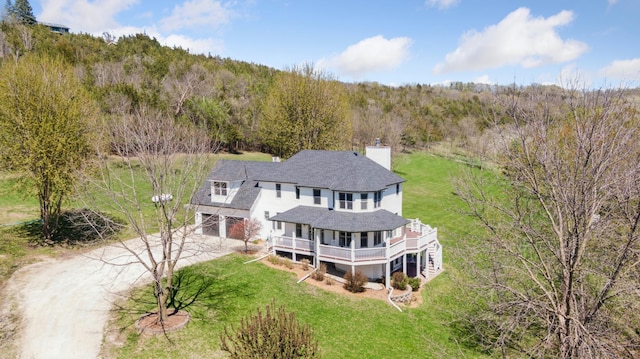 6715 Eldorado Way, Leon Twp, MN 55009 - aerial view of property and surrounding area featuring a heavily wooded area